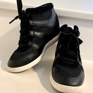 Barely worn Michael Kors wedge athletic shoes. Comfortable and chic!